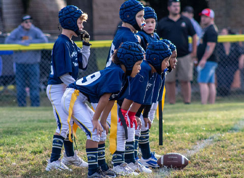 Kansas City Youth Tackle Football for 2nd and 3rd Graders ages 9 year olds and younger located in the heart Kansas City Missouri via the Missouri Wolverines Youth Football Club